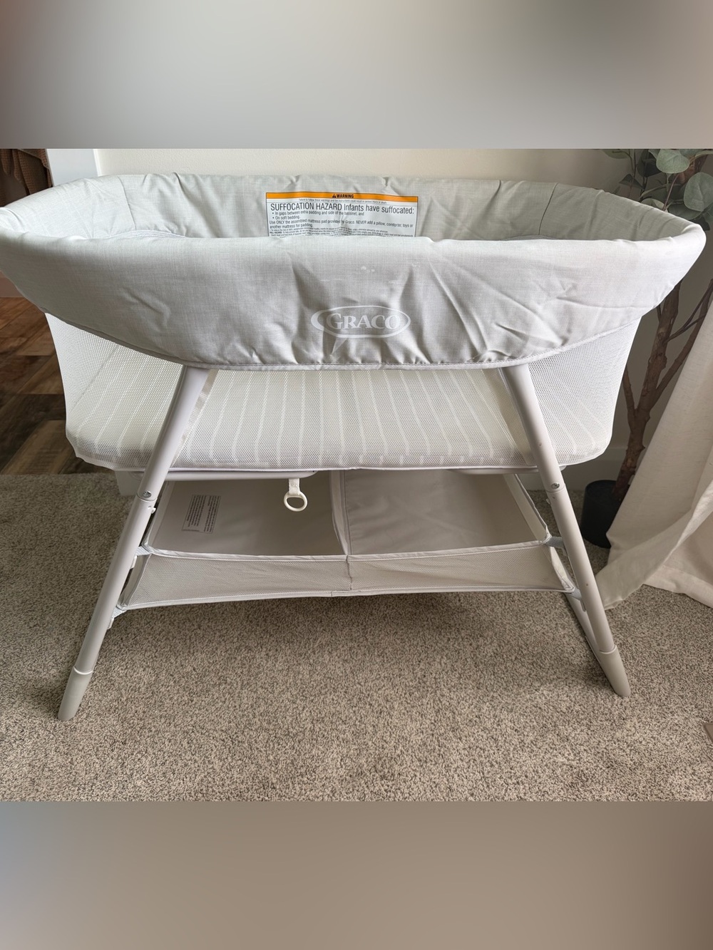Graco Light Gray Baby Bassinet with Storage Shelves
